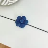 Collar tipo choker flor vaquera